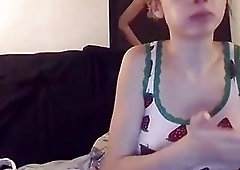 Cute shemale plays with her boner after having a dinner