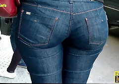Brunette babe on the street in huge ass tight jeans video