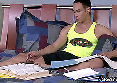 Horny college twink stroking his big cock