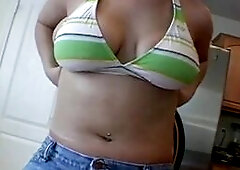 Bri showing her Bra closeup with big tits cleavage. She rubbing her big tits with lotion