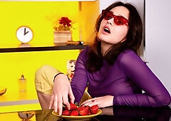 Brunette babe Michelle Can using berries to keep her pussy wet