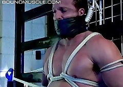 Derek is tied up and his balls are pulled tight