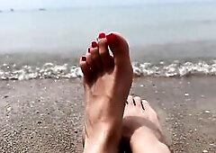 I’m playing with my hot feet during the time that relaxing on the seaside