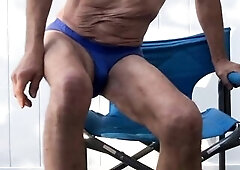 Unfathomable Pelvic Stretching in Blue Briefs on Blue Chair Late October 2024