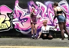 Beautiful lesbian threesome outdoors