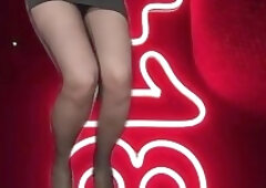 Mini skirt and black pantyhose