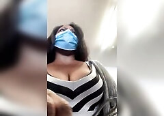 EXHIBITIONIST AT STORE CHECKOUT WITH MELONS OUT FLASHING