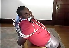 Black dude hogtied