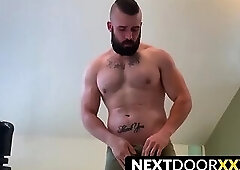 Bearded muscular stud Mathias strokes big dick solo
