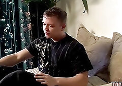 Jock teases with his feet and strokes his hard cock