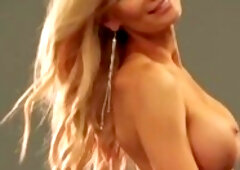 Huge boobs blonde Erin posed in photo session and exposed her nice body