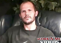 Stud passionately tugs on his huge dick after an interview