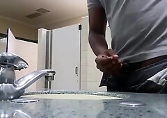 Black perv caught jerking in restroom