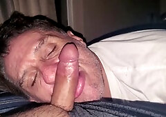 Stepdad deepthroats his buddy's juicy cock