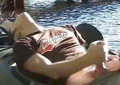 Naughty boy jerks in a boat