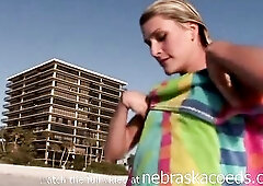 fake golden-haired slender honey being exposed on a public beach not getting caught