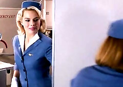 Margot Robbie showing her hawt cleavage in various hawt scenes including some in bikini and underware as hawt flight attendant. From Pan Am.