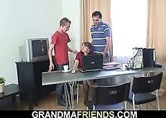 Old redhead office granny swallows two cocks at once