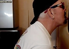 Gay stud at the gloryhole delights in devouring throbbing cock before getting pounded anally