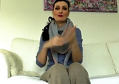 Elegant brunette Victoria Valente shows off her lovely hands and long nails in a cozy cashmere outfit