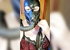 Emo trans gal playing with her rebreather in latex hood. Begin w open air, then close recent air