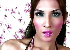 Pretty face ladyboy plays with small titties and shaved cock