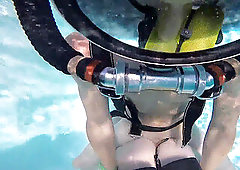 Jason and Monica plumb stiff underwater