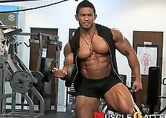 Stan Mcquay lifting weights, flexing, and posing + more