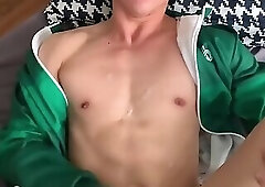 Dashing man in a food delivery uniform providing after-sales service