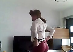 Crossdressing mature shemale shows off her body on a camera