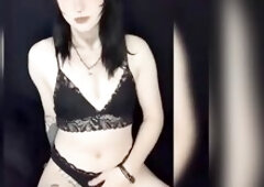 solo spooky trans woman playing with her soft rod