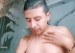 Hot water runs over my body as I touch myself