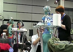 Artists and performers gather for a creative body painting event