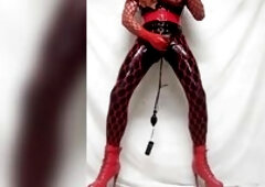 A quick latex movie scene including some viewer requests for a pump up latex plug and cum on boots .