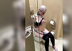 Breasty beauty watches porn and jerks off on the biffy, peeping