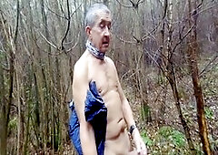 Mature babes Ora Nova and Candy H. get frisky in rain ponchos while having solo fun in the woods