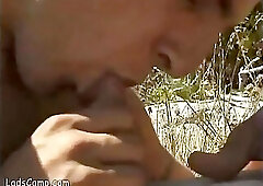 Steamy gay sex on the lake shore