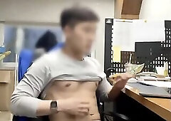 Coopid in front of his desk