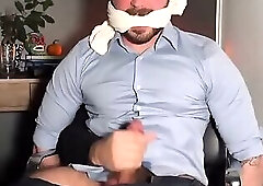 Tied up while getting jerked and spraying a huge load