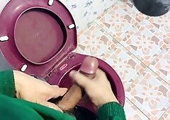 Amateur gay man jerks off in street food shop toilet