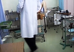 Busty Japanese has some fun during her kinky pussy exam