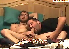 Chubby Guy Blowing His Friend While Watching Porn