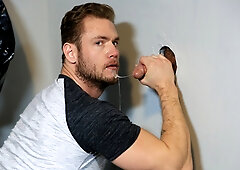 DILF throats cock through the glory hole and fucks in the ass like a slut