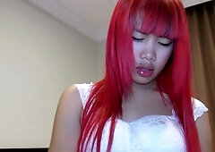 Asian girl giving blowjob and handjob tasting cum on the bed