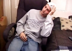 As a porn flick plays, young amateur Aaron Michaels strokes hard, pulls his cock out of his jeans, lets loose, and spills his nut on the bed.