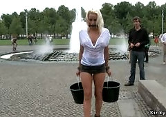 Busty blonde in wet shirt in public