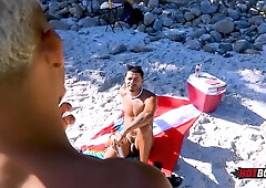 Providing it to the well-gifted dude on the beach!