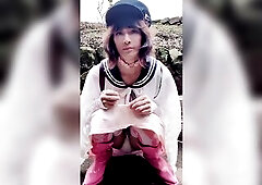 Just a glimpse of her pants outdoors.