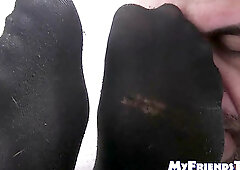 Man with beard tied up as his master licks his toes