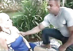 Handsome Black body builder hammering sweet blonde ladyboy on th